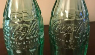 3 Coca - Cola Bottles,  