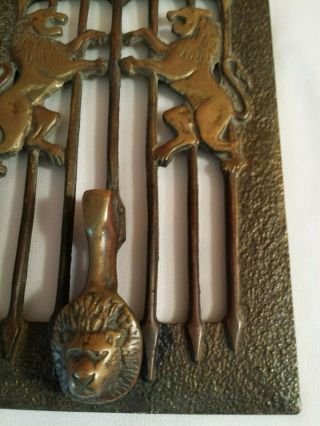 Unusual vintage brass & cast iron door knocker with 3 lions on it 8 3/4 