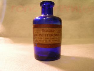 Vintage Mckesson & Robbins,  Round Cobalt Blue Glass Wintergreen Oil Bottle