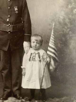 CIVIL WAR VET GUN IN UNIFORM W GAR BADGES AND CHILD W BADGES.  FLAG PHILADELPHIA 3