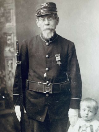 CIVIL WAR VET GUN IN UNIFORM W GAR BADGES AND CHILD W BADGES.  FLAG PHILADELPHIA 4