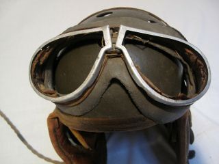 WWII U.  S.  Tanker helmet with earphones and goggles. 8