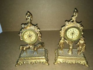 Vintage W.  F.  Rogers Mfg Co.  White Metal Figural Mantle Clocks