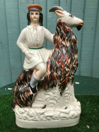Mid 19thc Staffordshire Male Figure Seated On Large Horned Goat C1860s