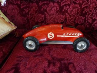 large (almost 14 inches) aluminum 1950 ' s era race car toy,  possibly tether car 3