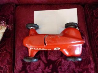 large (almost 14 inches) aluminum 1950 ' s era race car toy,  possibly tether car 5