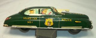 Marx Dick Tracy squad car no.  1 with window gun,  tin windup 11 in.  (10) 2