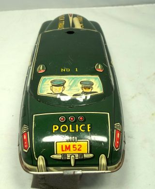 Marx Dick Tracy squad car no.  1 with window gun,  tin windup 11 in.  (10) 4