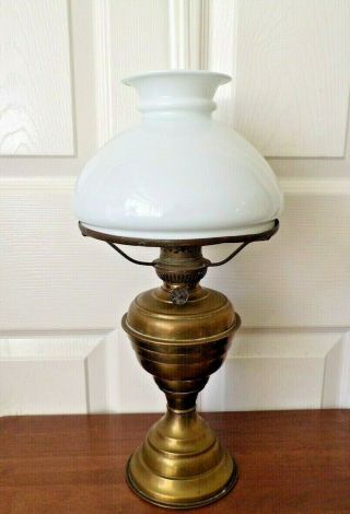 A Vintage Brass Kosmos Oil Lamp With White Glass Shade Order