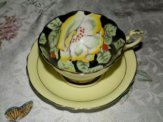 Vintage Paragon Black With Yellow Flowers & Yellow Band Footed Tea Cup & Saucer