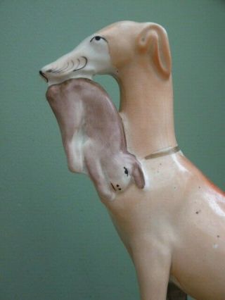 19thc STAFFORDSHIRE GREYHOUND IN SITTING POSE WITH RABBIT IN MOUTH 2