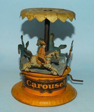 Carousel Crank Operated Tin Toy