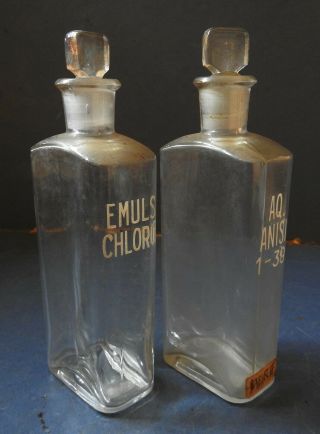 Two Victorian Glass Chemists Bottles Inscribed In White Lettering