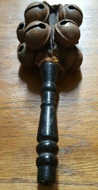 Antique Hand Held Rattle: Christmas Caroler,  Baby Rattle Wood And Leather Wrap