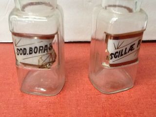 TWO ANTIQUE W.  T.  CO.  LABEL UNDER GLASS APOTHECARY (Pharmacy) BOTTLES 2