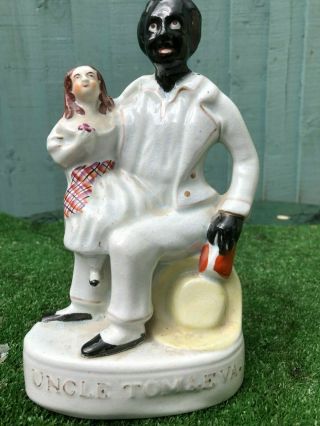 Mid 19thc Staffordshire Figurine Group: Blackamoor Uncle Tom & Eva C1852