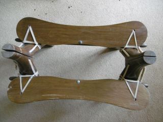 Vintage wooden camel saddle stool with decorative brass studs and emblems 3