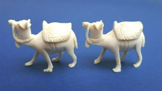Pair Art Deco Chinese Intricately Carved Celluloid Bone Camel Miniature Figures