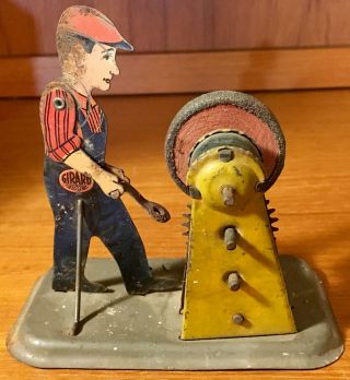 ANTIQUE 1920 ' S GIRARD KEY WIND TIN LITHO MAN WITH GRINDING WHEEL TOY 4