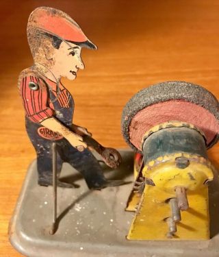 ANTIQUE 1920 ' S GIRARD KEY WIND TIN LITHO MAN WITH GRINDING WHEEL TOY 6