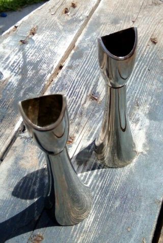 A mid century modernist silver plated candlestick by Grenadier. 4