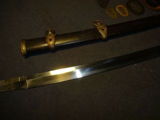 Japanese WWll Naval officer ' s sword in mountings,  