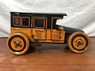 Vintage 1920’s J.  Chein & Co.  Tin Litho Pressed Steel Wind Up Yellow Taxi Toy