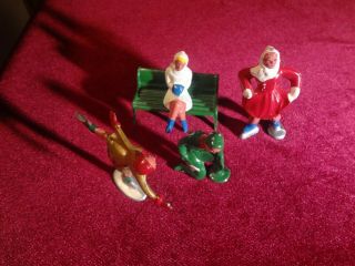 VINTAGE SET OF CAST IRON SANTA on a SLEIGH,  ICE SKATING FIGURES AND SLED RIDERS 6