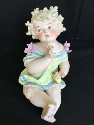 Antique German Bisque Porcelain Piano Baby Girl Holding A Pear Figurine