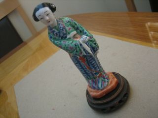 Vintage Chinese Hand Painted Porcelain Figurine On Wood Stand.  (rare)