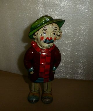 Vintage Tin Toy Hobo Lithographed By Rope Made In Germany 1950.
