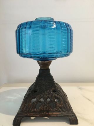 Antique Turquoise Glass Oil Lamp On Cast Metal Base