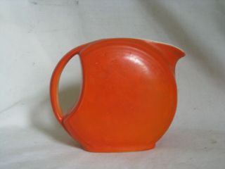 vintage ceramic mid century modern small orange pitcher retro handled round disc 2