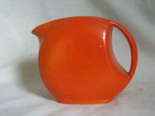 vintage ceramic mid century modern small orange pitcher retro handled round disc 4