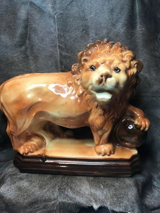 Vintage Ceramic Asian Guardian Lion With His Left Paw On A Sphere.  14”x5 1/4”x11”