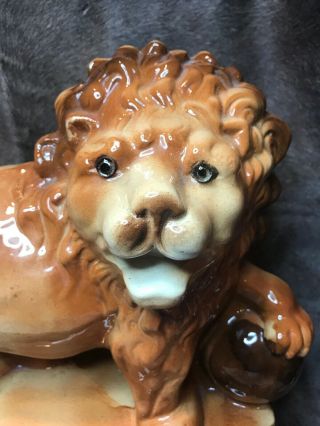 Vintage Ceramic Asian Guardian Lion With His Left Paw On A Sphere.  14”x5 1/4”x11” 2