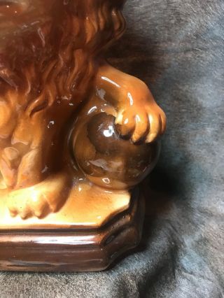 Vintage Ceramic Asian Guardian Lion With His Left Paw On A Sphere.  14”x5 1/4”x11” 3