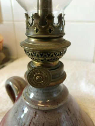 oil lamp finger hold made in france by gaudard,  pot base.  13 