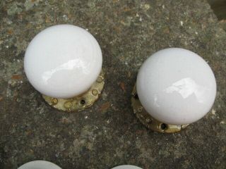 TWO PAIRS OF ANTIQUE VICTORIAN DOOR KNOBS/HANDLES.  WHITE CERAMIC.  ORNATE GILDING. 8