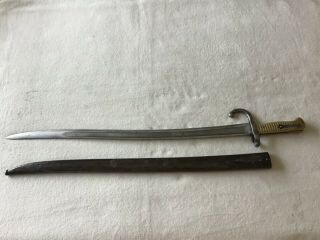 ANTIQUE FRENCH BAYONET,  BRASS HANDLE SIGNED,  DATED 1867 with scabbard. 2