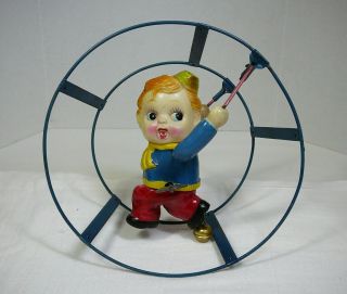 Vintage Occupied Japan Celluloid Wind Up Toy Roll Around Boy Cage Ring Hoop