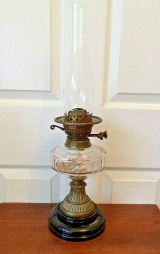 A Victorian Oil Lamp Cut Glass Font On Black Glazed Base Order