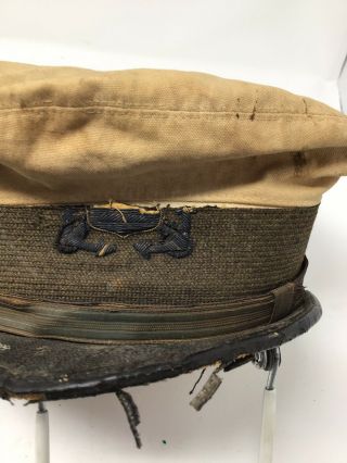 U.  S.  Light House EST.  Garrison Cap Two L.  H.  Buttons 7