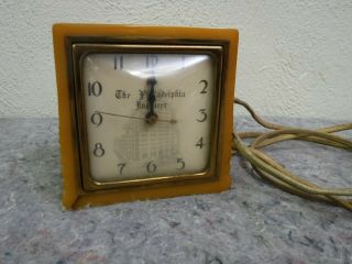 Vintage " Philadelphia Inquirer " Electric Alarm Clock - Golden Yellow Bakelite Case
