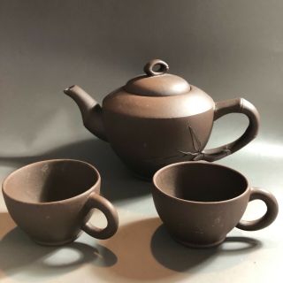 Chinese Yixing Zisha Clay Teapot With Bamboo Design And Two Cups
