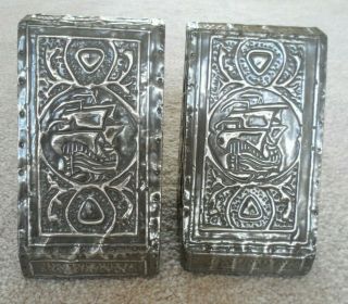 A Antique Art Nouveau Pewter Covered Book Rests With A Galleon Image.