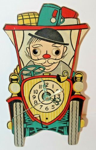 Vintage German Wood Man Driving A Car Moving Eye Battery Operated Clock