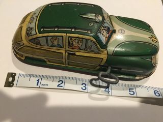 Vintage 1950’s Marx Tin Lithograph Wind Up Woody Wagon Coupe Car Toy