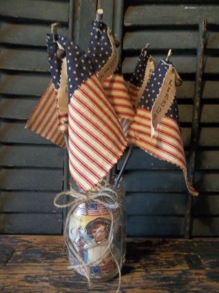 Gathering Of Primitive Handmade Americana Flags In Vintage Glass Mason Jar