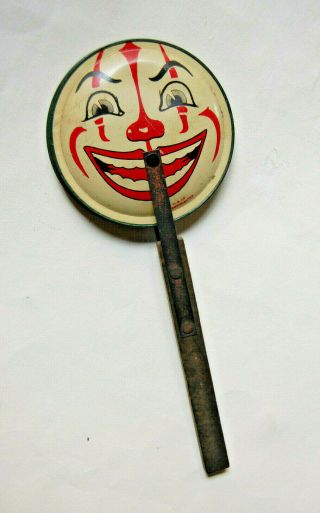 Vintage M.  B.  Co.  Tin Litho Clown Face Clapper Noisemaker Toy With Wooden Handle